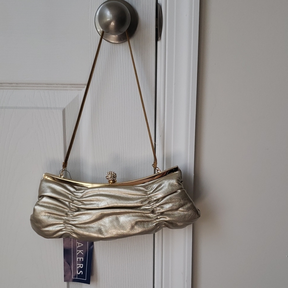 2 gold clutch bags